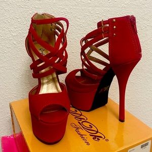 Never worn Red Heels